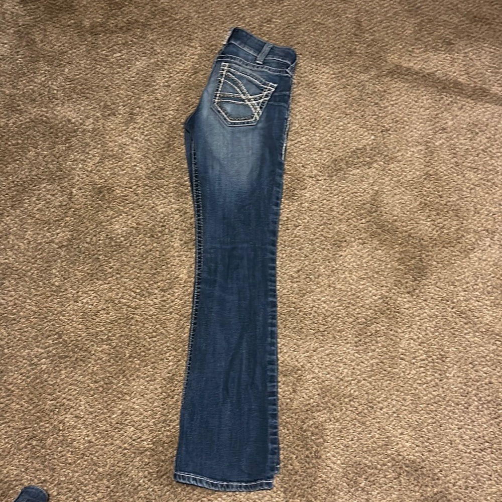 In great condition except for the tiny hole.